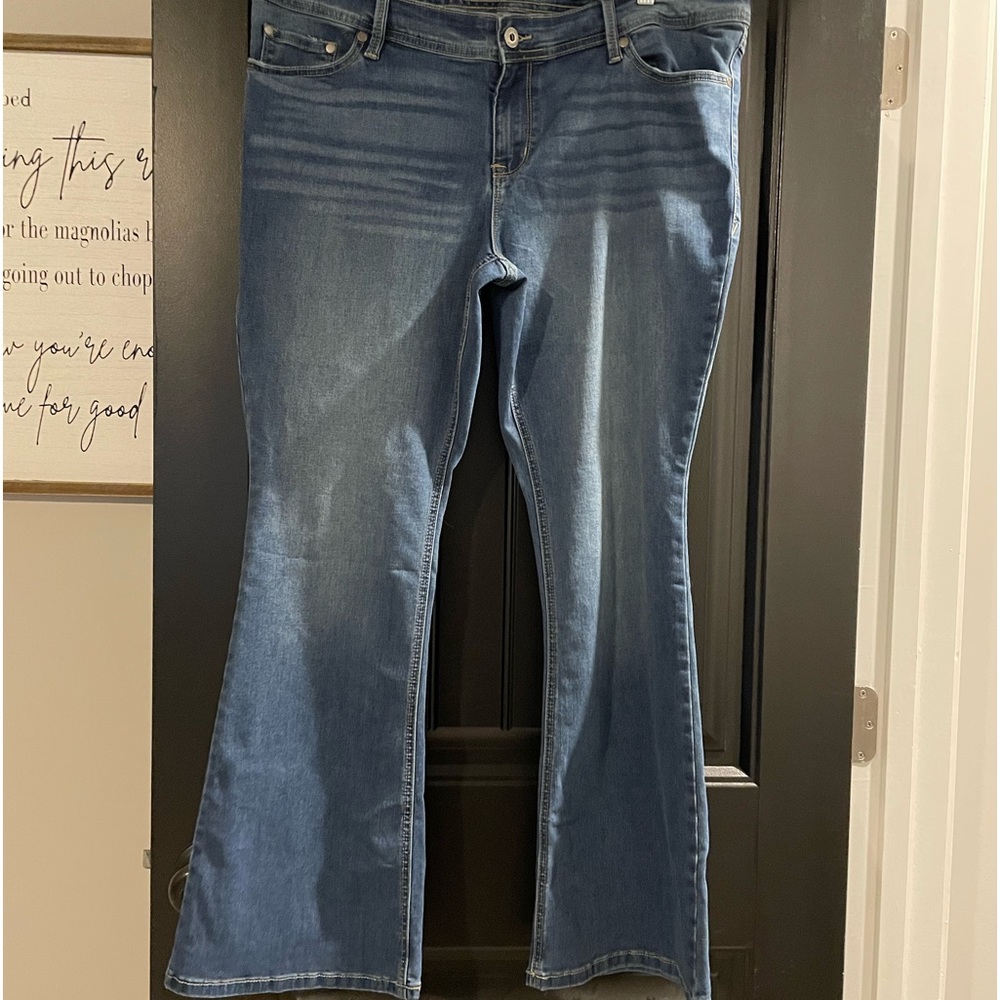 Ladies Torrid Feel the Fit super stretch luxe slim bootcut jeans.